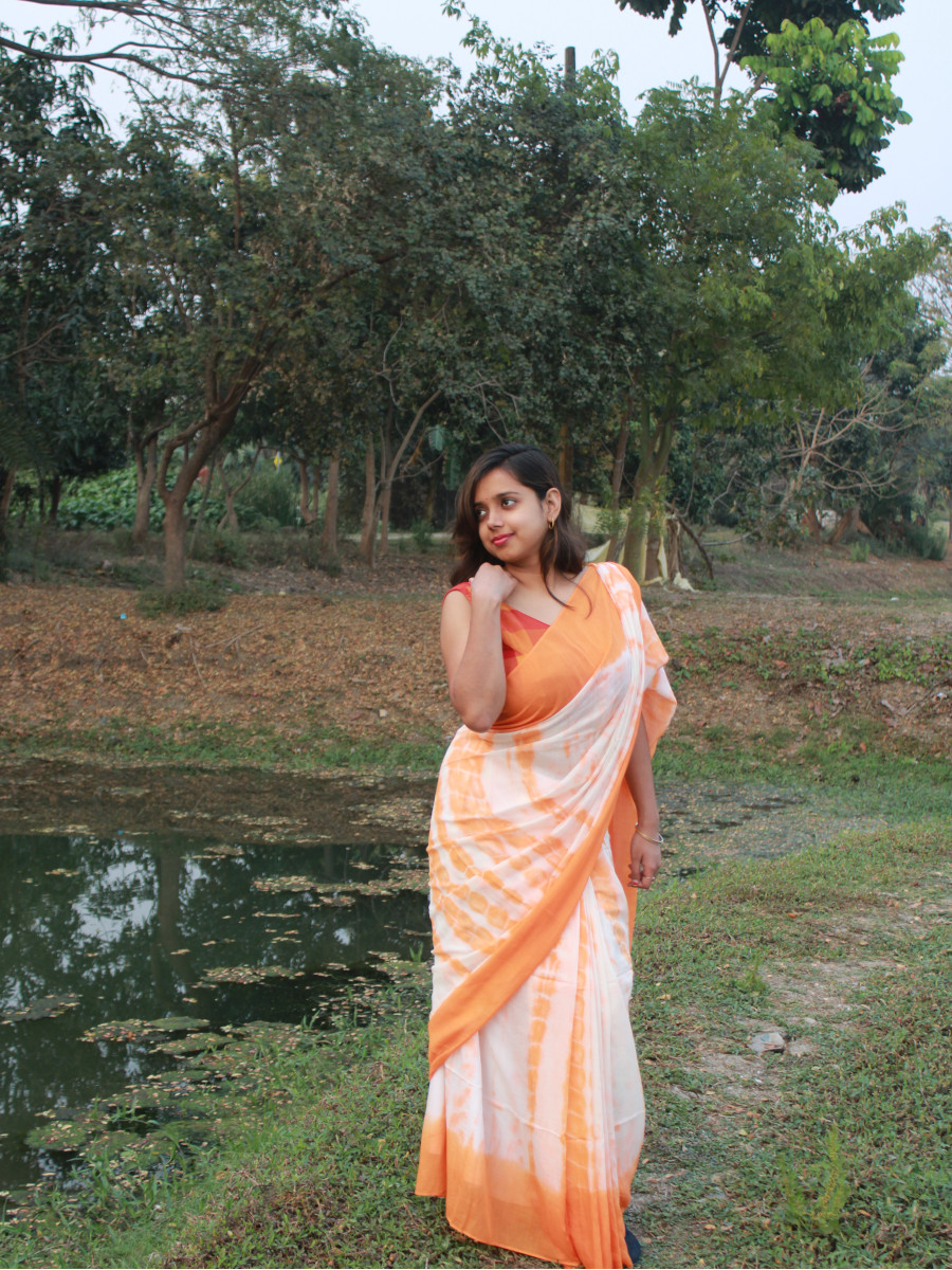 sunsetdreams_orangeand white_mulcotton_shibori_dyed_saree